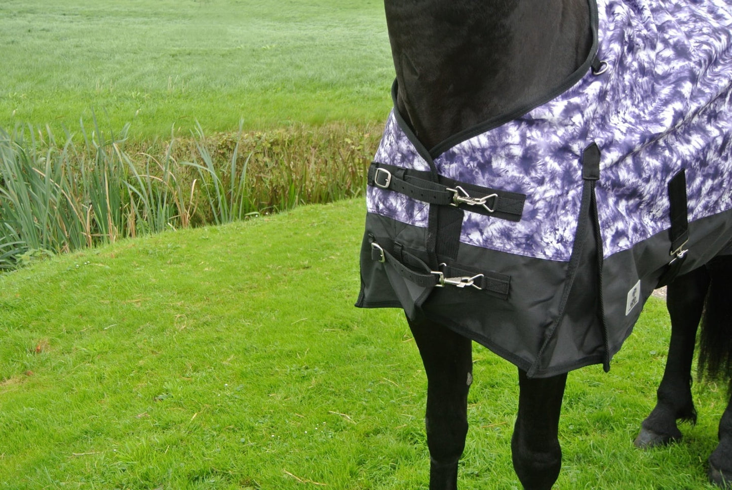 Regendeken de luxe 0 gram met fleecevoering Zwart/paars